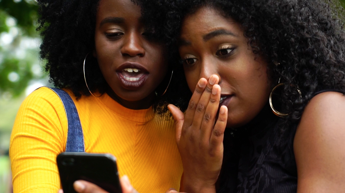 Two women, shocked at how easy the Flock app is to use!